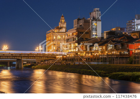 A seasonal feature of summer in Kyoto: Kamogawa Nouryou-ka (cool platform over the Kamo River) night view 117438476