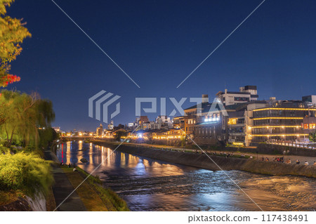 A seasonal feature of summer in Kyoto: Kamogawa Nouryou-ka (cool platform over the Kamo River) night view 117438491