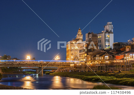 A seasonal feature of summer in Kyoto: Kamogawa Nouryou-ka (cool platform over the Kamo River) night view 117438496