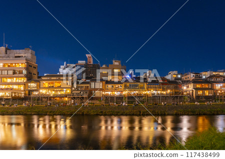A seasonal feature of summer in Kyoto: Kamogawa Nouryou-ka (cool platform over the Kamo River) night view 117438499