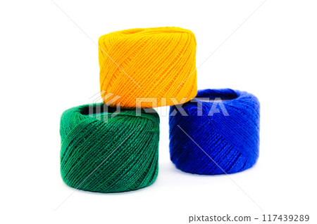 A picture of thread spools isolated on white background 117439289