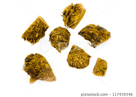 dried turmeric isolated on the white background 117439346