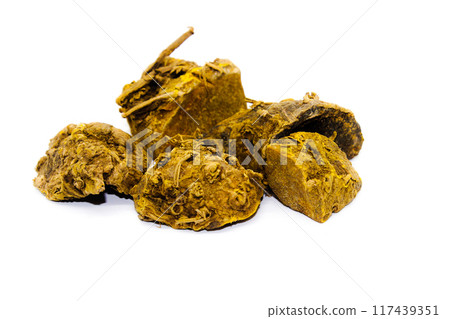 dried turmeric isolated on the white background 117439351