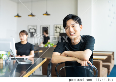 Young engineer working in the office Young engineer working in the office 117440105