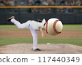 Baseball pitcher throwing fast ball to batter in a stadium 117440349