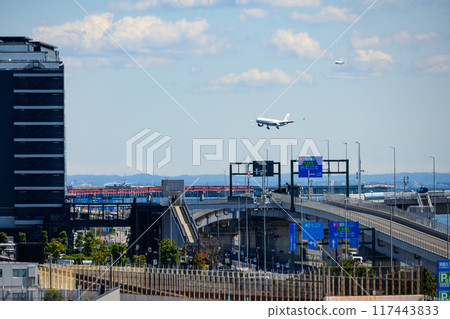Two passenger planes preparing to land at Haneda Airport Two passenger planes preparing to land at Haneda Airport 117443833
