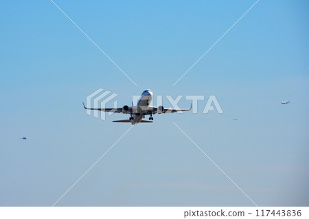 Four passenger planes flying near Haneda Airport Four passenger planes flying near Haneda Airport 117443836