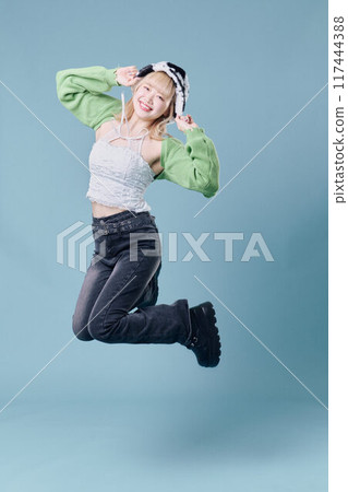 jumping woman 117444388