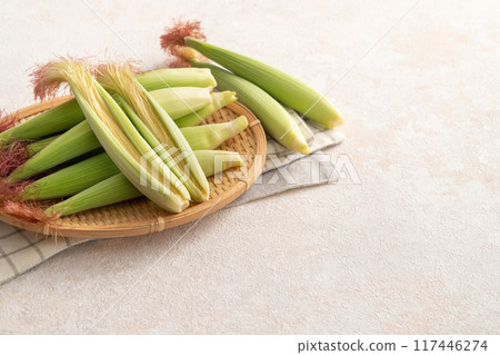 Corn tips, corn shoots, vegetables, baby corn husk 117446274