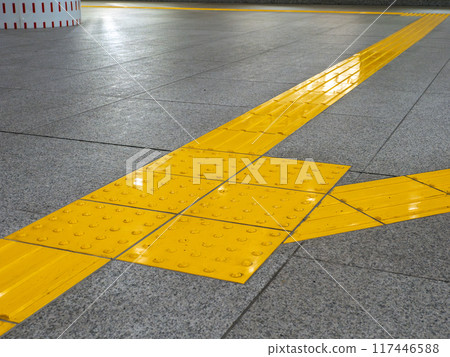 Example of braille block installation in underground pedestrian space 117446588