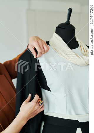 Trying unfinished suit on mannequin Trying unfinished suit on mannequin 117447263