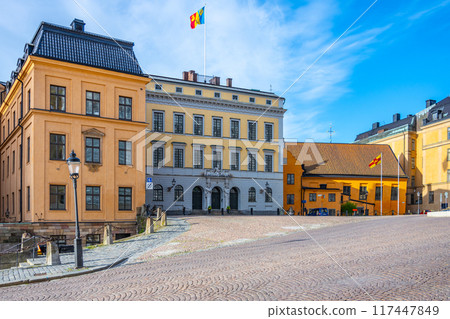 The baroque-style Tessin Palace basks in sunlight, with its ornate facade proudly displayed, standing in the historic Gamla stan area of Stockholm. Sweden 117447849