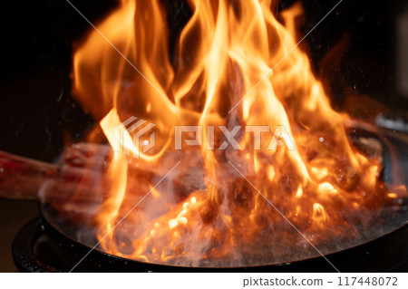 Tomahawk beef flambé Tomahawk beef flambé 117448072