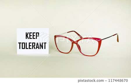 Notepad with the text Be tolerant. Concept of tolerance, diversity, social and business teamwork. Notepad with the text Be tolerant. Concept of tolerance, diversity, social and business teamwork. 117448670
