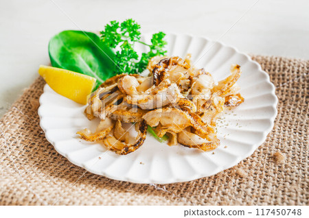 Stir-fried clams in butter and soy sauce 117450748