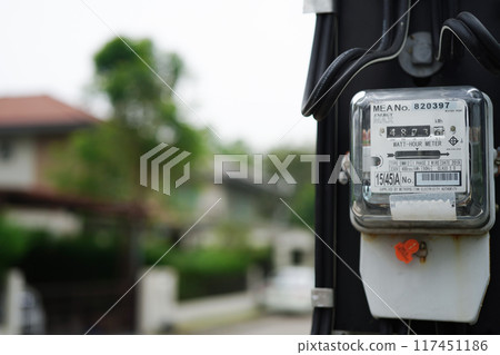Bangkok, Thailand - May 15, 2022 Electric measuring power meter for energy cost at home and office. 117451186