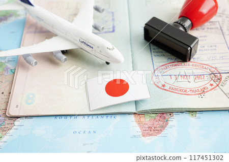 Bangkok, Thailand December 10, 2023 Japan Visa and passport document to immigration at airport in country. 117451302