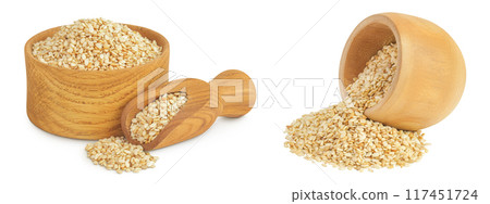 Sesame seeds in wooden bowl and scoop isolated on white background 117451724