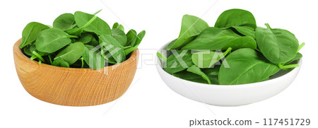 Baby spinach leaves in wooden bowl isolated on white background 117451729