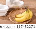 Toilet bowl and fresh banana 117452271