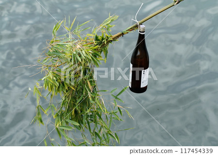 A summer festival in a port town A summer festival in a port town 117454339