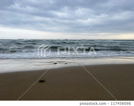 Seascape under a cloudy sky. Skagerrak, Kattegat strait in Skagen, Denmark Seascape under a cloudy sky. Skagerrak, Kattegat strait in Skagen, Denmark 117456098