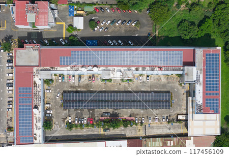 Parking lot and roof building covered with solar panels Parking lot and roof building covered with solar panels 117456109