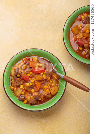 Two bowls of Carbonada Criolla, Argentinian beef casserole stew with beef, sweet potatoes and corn Two bowls of Carbonada Criolla, Argentinian beef casserole stew with beef, sweet potatoes and corn 117456560