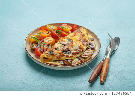 Omelette with mushrooms and cherry tomatoes for healthy breakfast from above 117456594