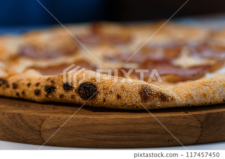 Pizza with salami and prosciutto. Meat pizza with cheese 117457450