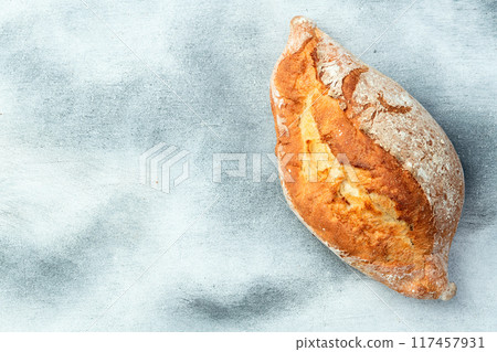 Loaf of wheat hearth bread . Top view Loaf of wheat hearth bread . Top view 117457931