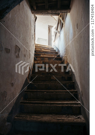 View of the staircase of an abandoned fortress 117458404