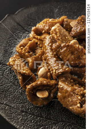 View of a plate of shebaquia, typical sweet of the month of Ramadan in Morocco View of a plate of shebaquia, typical sweet of the month of Ramadan in Morocco 117458414