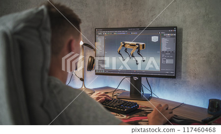 Young designer creates 3D model and animation of the robot dog on computer Young designer creates 3D model and animation of the robot dog on computer 117460468