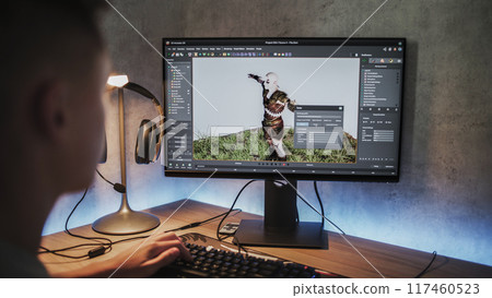 Young designer creates 3D model and animation using computer 117460523