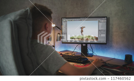 Young designer creates 3D model and animation using computer 117460562