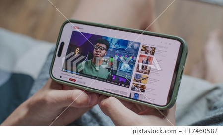 Blogger content about color correction displayed on smartphone screen 117460582