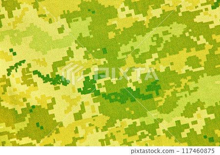 Yellow and green pixelated camouflage pattern as abstract background. Yellow and green pixelated camouflage pattern as abstract background. 117460875