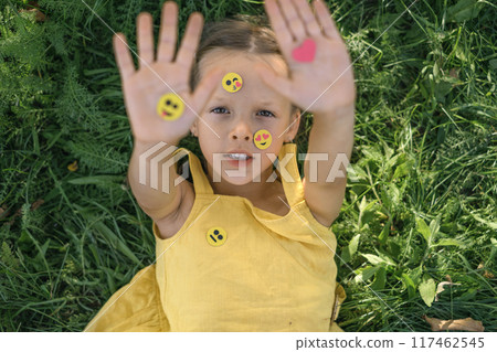 Small paper emojis and a heart used for likes on social networks 117462545