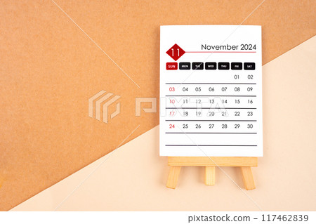2024 November calendar page on brown background. 117462839