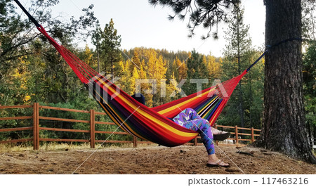 Relaxing in a Hammock in Running Springs Mountains, California Relaxing in a Hammock in Running Springs Mountains, California 117463216