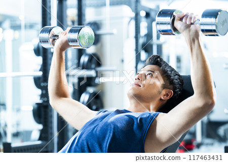 Men training in the gym 117463431