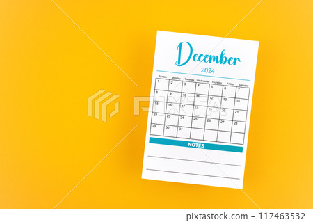 December 2024 calendar page on yellow background. December 2024 calendar page on yellow background. 117463532