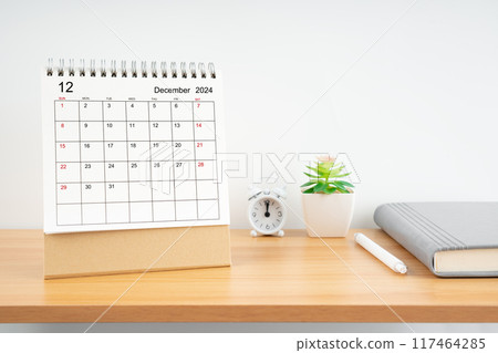 December 2024, Monthly desk calendar for 2024 year on wooden table. December 2024, Monthly desk calendar for 2024 year on wooden table. 117464285