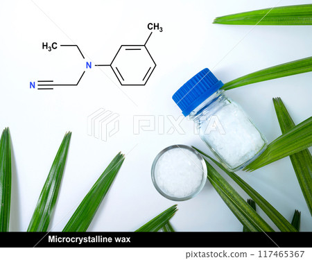 Microcrystalline wax with chemical formula on white laboratory table. Top view Microcrystalline wax with chemical formula on white laboratory table. Top view 117465367