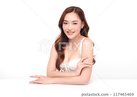 Beautiful young asian woman with clean fresh skin on white background, Face care, Facial treatment, Cosmetology, beauty and spa, Asian women portrait. Beautiful young asian woman with clean fresh skin on white background, Face care, Facial treatment, Cosmetology, beauty and spa, Asian women portrait. 117465469