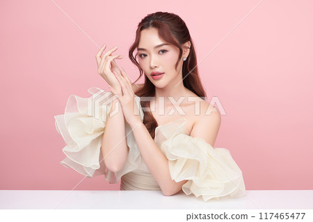 Beautiful young asian woman with clean fresh skin on pink background, Face care, Facial treatment, Cosmetology, beauty and spa, Asian women portrait. 117465477