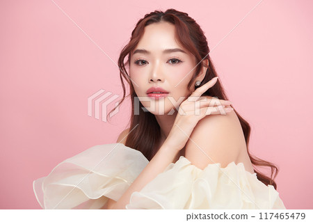 Beautiful young asian woman with clean fresh skin on pink background, Face care, Facial treatment, Cosmetology, beauty and spa, Asian women portrait. 117465479