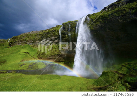 Seljalandsfoss waterfall and rainbow in Iceland in summer Seljalandsfoss waterfall and rainbow in Iceland in summer 117465586