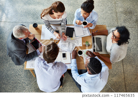 Top view, business people and collaboration in meeting, teamwork and cooperation with decision, choice and project. Group, staff and employees with documents, tech and sales report with brainstorming Top view, business people and collaboration in meeting, teamwork and cooperation with decision, choice and project. Group, staff and employees with documents, tech and sales report with brainstorming 117465635